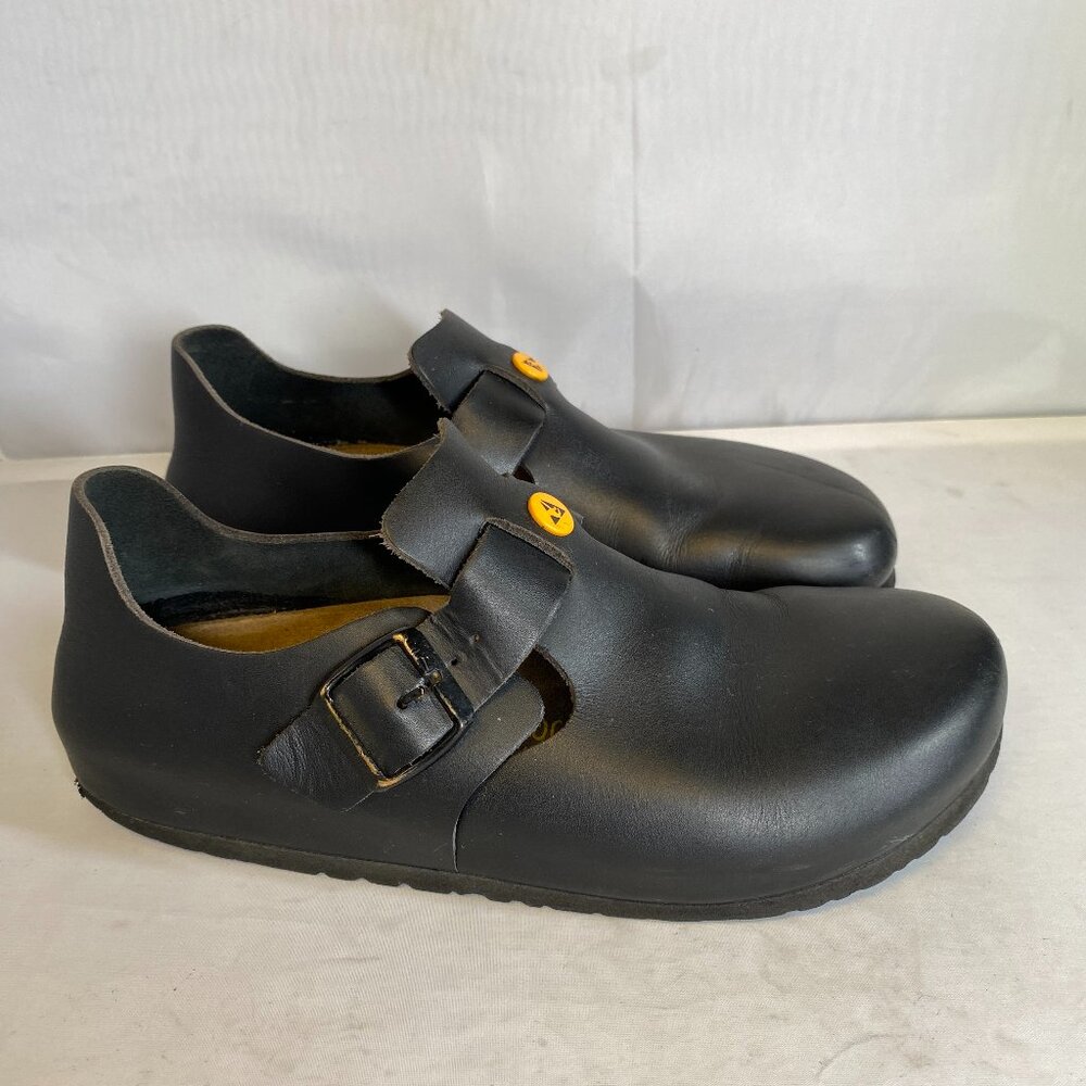 Birkenstock Black Closed-Toe Mule Clogs with Yellow Buttons